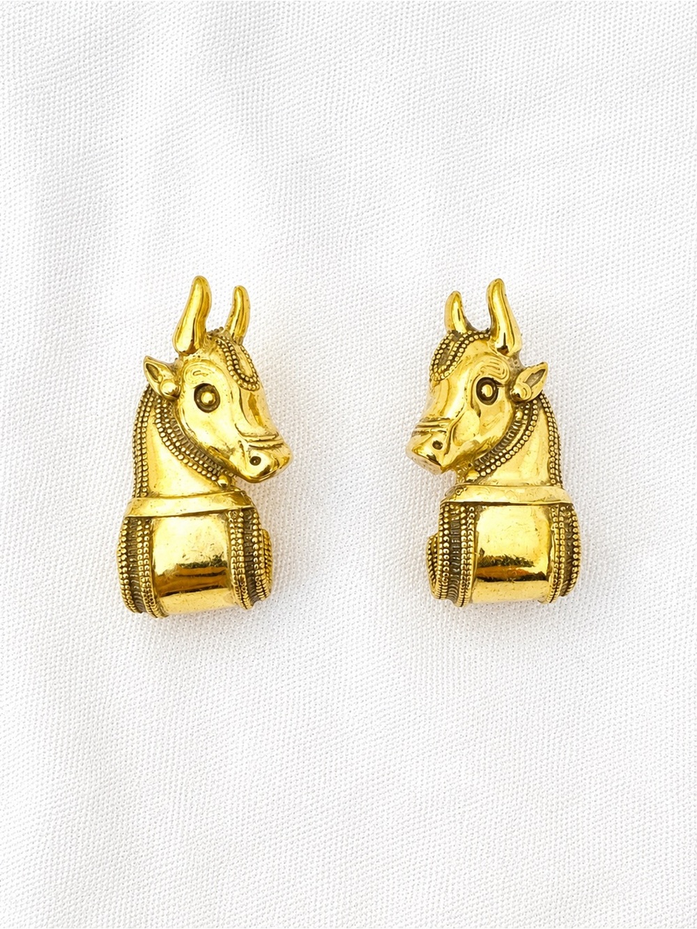 Vintage brass gold clip on bull earrings